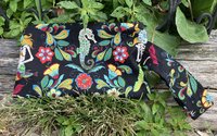 Handmade zippered wristlet bag (Clutch) Large by Lucky Burrito featuring Alexander Henry's Skeleton Fabric, Mermaid Fabric, Esqueletos del Mar - Day of the Dead Mermaids on black