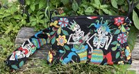 Handmade zippered wristlet bag (Clutch) Large by Lucky Burrito featuring Alexander Henry's Skeleton Fabric, Mermaid Fabric, Esqueletos del Mar - Day of the Dead Mermaids on black