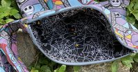 Handmade zippered wristlet bag (Clutch) Large by Lucky Burrito featuring Nightmare before Christmas fabric