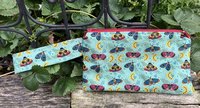 Handmade zippered wristlet bag (Clutch) Large by Lucky Burrito featuring Moths and moons