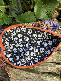 Handmade by Lucky Burrito featuring flower skulls fabric, zippered wristlet bags (clutch)