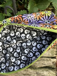 Handmade zippered wristlet bag (Clutch) Large by Lucky Burrito featuring flower skulls fabric