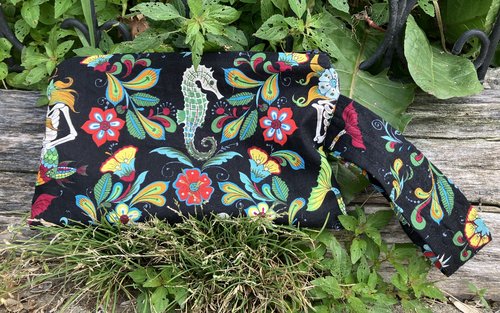 Handmade zippered wristlet bag (Clutch) Large by Lucky Burrito featuring Alexander Henry's Skeleton Fabric, Mermaid Fabric, Esqueletos del Mar - Day of the Dead Mermaids on black