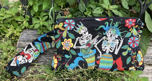 Handmade zippered wristlet bag (Clutch) Large by Lucky Burrito featuring Alexander Henry's Skeleton Fabric, Mermaid Fabric, Esqueletos del Mar - Day of the Dead Mermaids on black