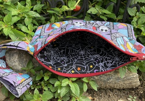 Handmade zippered wristlet bag (Clutch) Large by Lucky Burrito featuring Nightmare before Christmas fabric