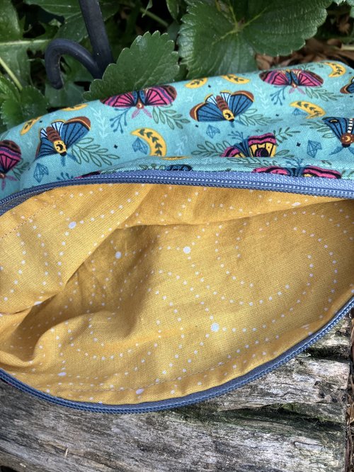 Handmade zippered wristlet bag (Clutch) Large by Lucky Burrito featuring Moth and Moons