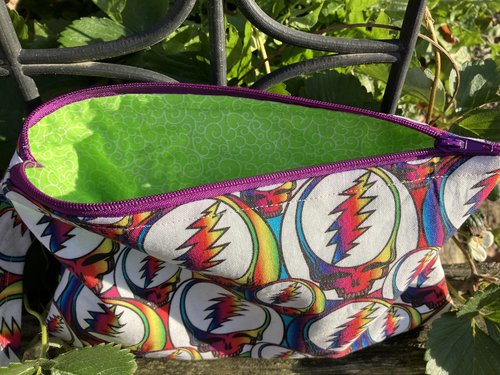 Handmade zippered wristlet bag (Clutch) Large by Lucky Burrito featuring Grateful dead stealie 