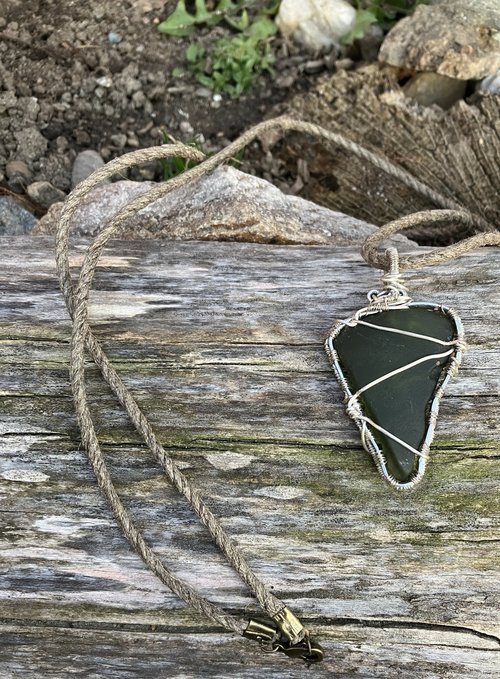 River Glass Necklace  green river glass  silver wrapped 30 in dark  Hemp cord
