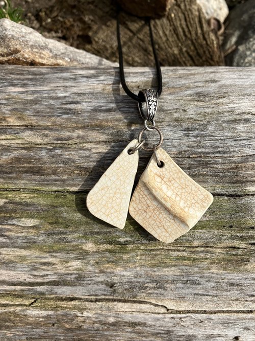 River Glass Necklace   River polished antique pottery shards  black cotton cord