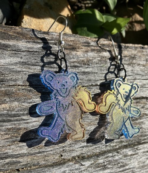 Grateful Dead  dancing bear resin with varying colors purple to  golden orange in shifting hues of  mica glitter 