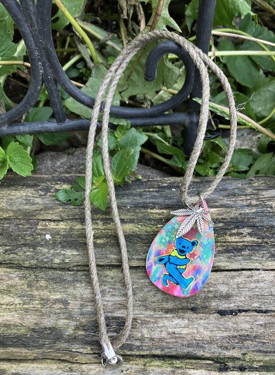 Tear drop necklace with blue dancing bear and cannabis leaf charm