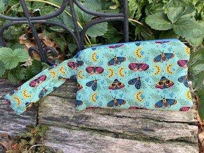 Handmade by Lucky Burrito featuring moons and moths fabric, zippered wristlet bags (clutch)