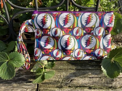 Handmade zippered wristlet bag (Clutch) Large by Lucky Burrito featuring Grateful dead stealie 