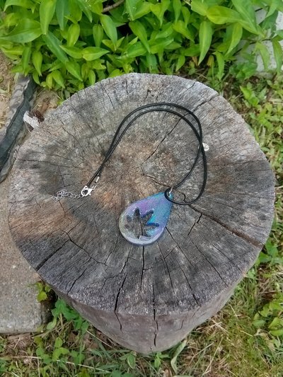 Resin teardrop cannabis leaf pendant black cord