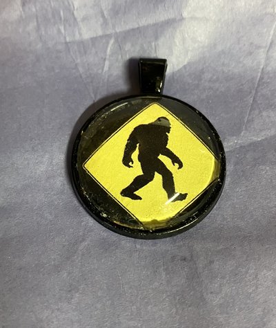 Sasquatch Glass   and metal Pendant