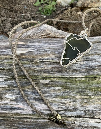 River Glass Necklace  green river glass  silver wrapped 30 in dark  Hemp cord
