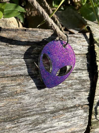 moby purple Alien resin pendant on  hemp cord 