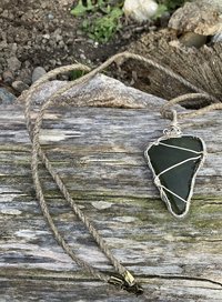 River Glass Necklace  green river glass  silver wrapped 30 in dark  Hemp cord