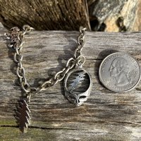 smaller Silver chainlink charm bracelet with grateful dead charms