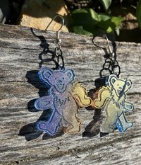 Grateful Dead  dancing bear resin with varying colors purple to  golden orange in shifting hues of  mica glitter 