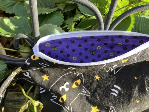 Handmade by Lucky Burrito featuring black cosmic cats, zippered wristlet bags (clutch)