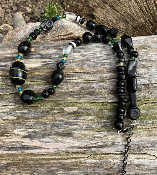 ceramic skulls  emerald and ebony  toned  glass beaded necklace 