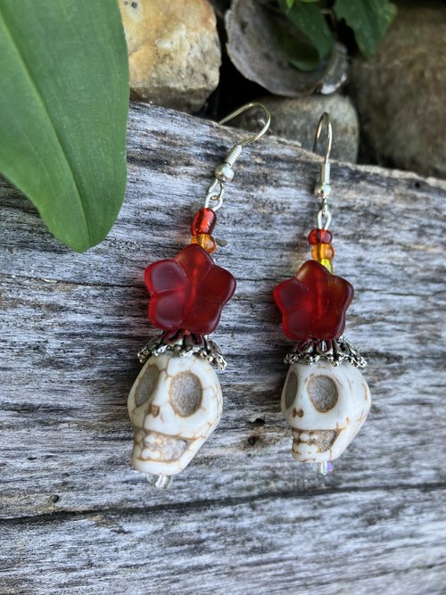 White Skull bead with a metal bead cap glass flower 