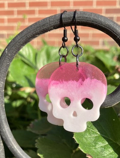 Resin pink and glow in the dark skull earrings